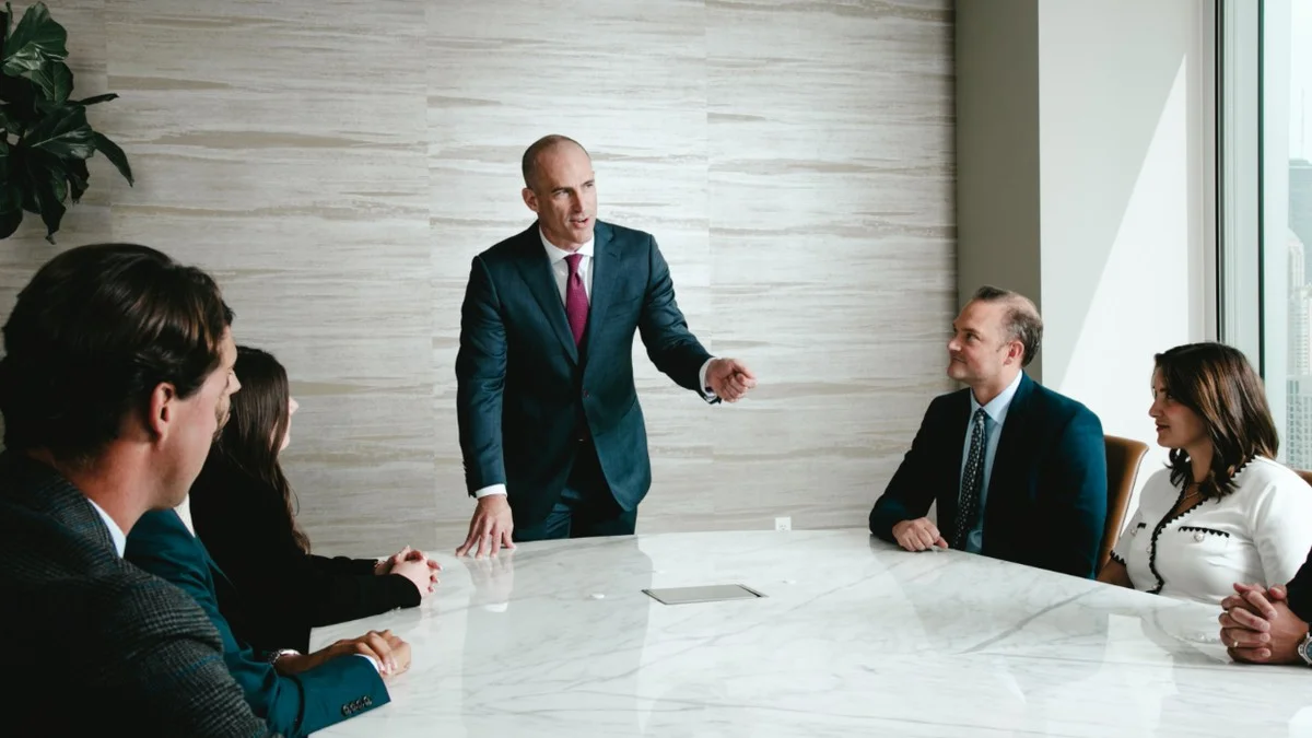 Personal injury attorney meeting with accident victim for free no-obligation case evaluation in modern California law office